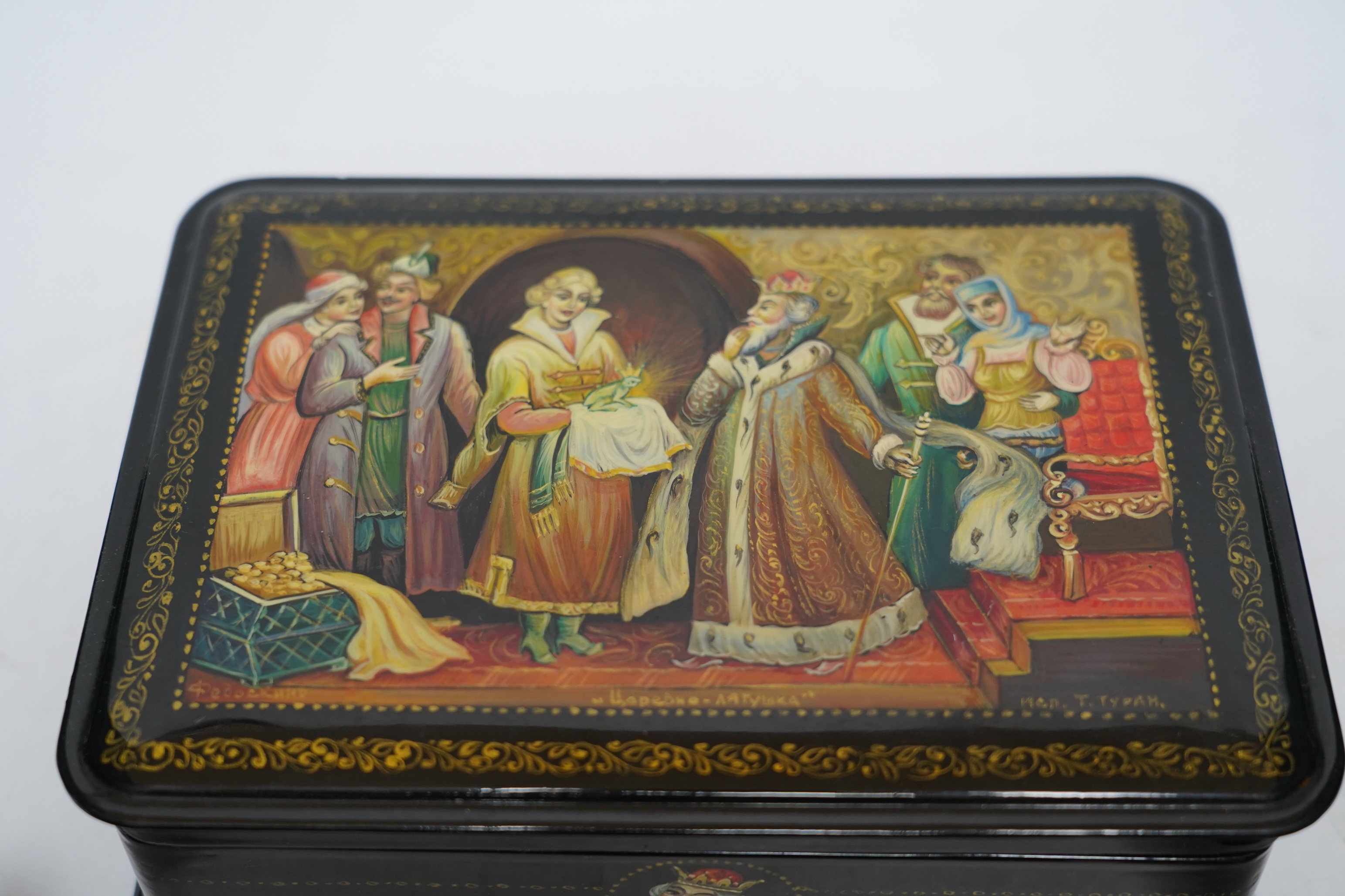 Seven Russian lacquer boxes, largest 21.5cm wide